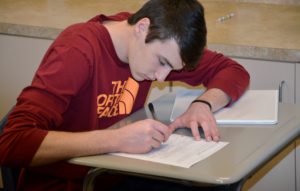Male Student Taking a Test