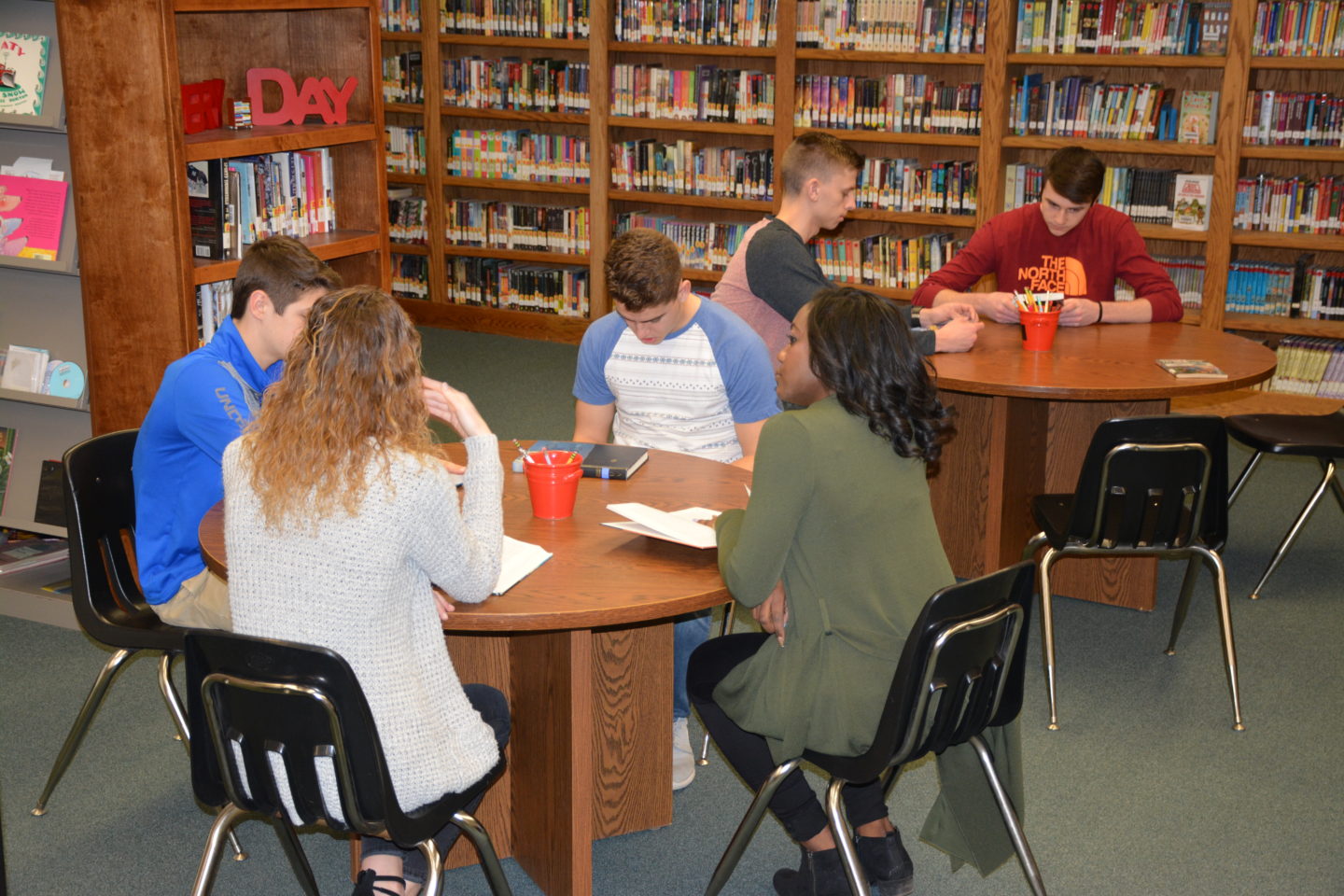 Groups of Students Reading in the Library